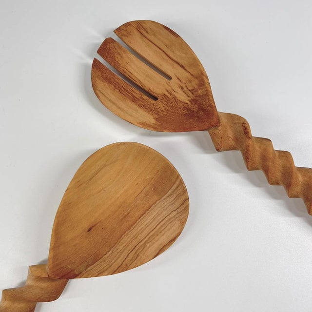A set of wood hand-carved spoons. Made throughout eastern Africa where renewable and sustainable deciduous tree resources...