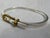 Sterling silver hallmarked to the inner surface TC 99 Mexico Sterling. The length is 6.25" and 3mm wide. The weight is 8.1...