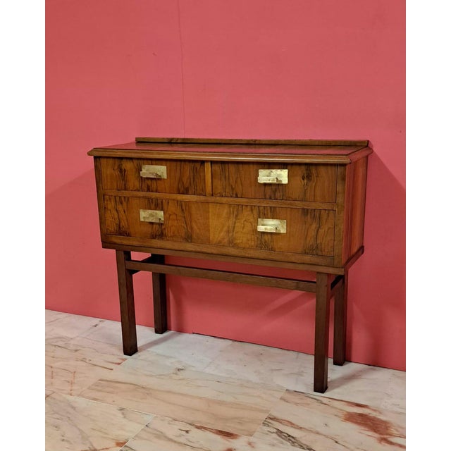 Spanish Mid-Century Modern style sideboard/chest of drawers with Scandinavian inspiration. Rectangular body raised on four...