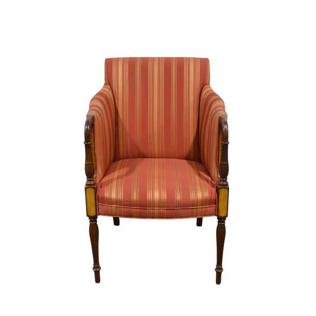 A fine pair of very well-made Southwood Furniture armchairs. The chairs are finely inlaid and are nicely upholstered in an...