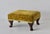Vintage Queen Anne-style footstool/Ottoman with a mustard-yellow velvet cushion and curved wooden cabriole legs. The...
