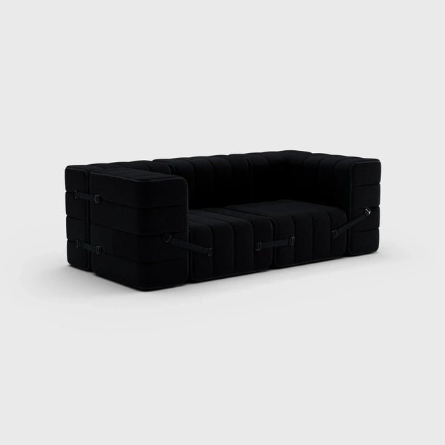 The classic seven. Why not turn a modular sofa into a classic sofa. A really compact, cosy couch with full armrests. And...