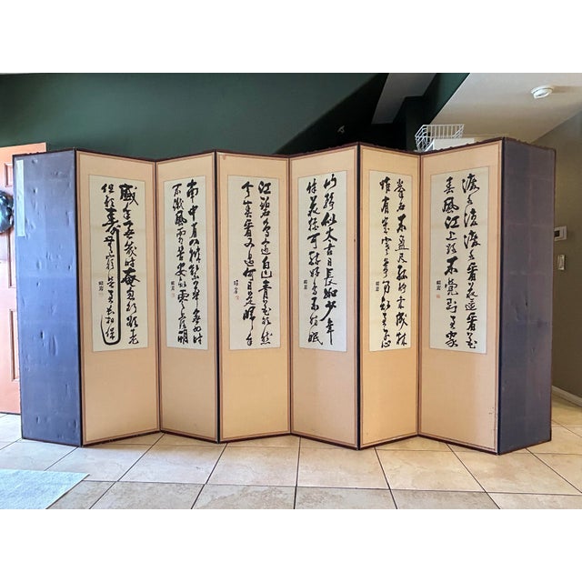 Vintage 1970’s 8 panel room divider is an absolute stunner. Embroidered silk panels feature jewel toned flowers (peonies,...