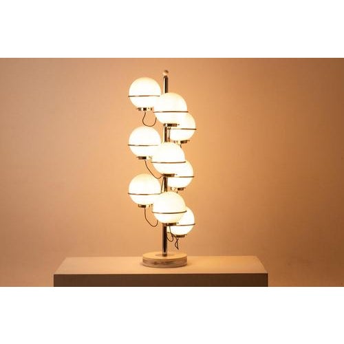 Nine-Light Floor Lamp by Gino Sarfatti for Arteluce, 1960s, in Good conditions. This piece is designed in the style of the...