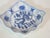 Hand painted blue and white Asian bowl decorated with a center dragon, clouds scrolls and flowers. It is square shaped...