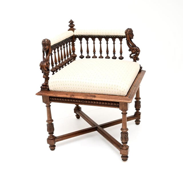 A stunning antique Victorian carved walnut corner chair of the highest order. This was made in Europe, possibly France, it...