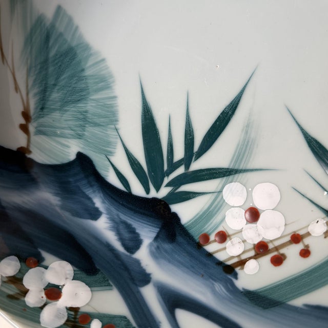 This vintage Japanese porcelain bowl dates from the 1950s. Dimensions: height 9.5 cm, diameter 27 cm. The inside is...