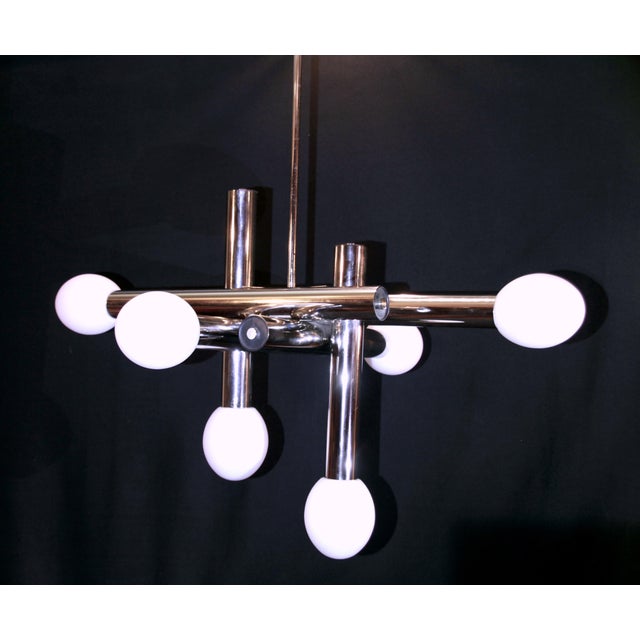 Superb and rare Pair Of Chrome Chandelier attributed to Gaetano Sciolari. Italian Modernism, inspired by the Space Age...