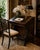 19th-century Victorian mahogany Davenport desk featuring an elegantly sloped black leather writing surface. The lift-up...