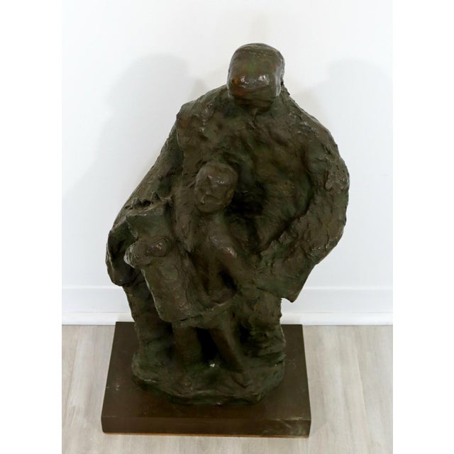 For your consideration is a contemplative, bronze sculpture of a father with a son, holding the Torah, by an anonymous...