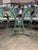 Mid 20th Century Veneman Hollywood Regency Cast Aluminum Clamshell Set With Attached Tags Includes Four Chairs, Two Bar Stools, and Glass Top Pedestal Table, 7 Pieces For Sale - Image 5 of 12