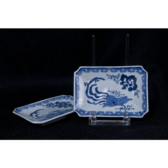 Pair of rectangular blue and white decorated dishes with canted corners. Made in Japan, c. 1870.