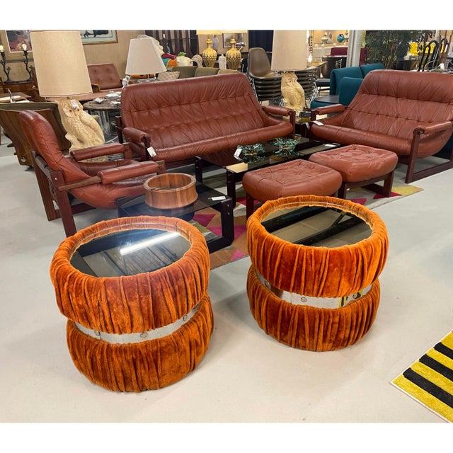This pair of vintage 1970s side tables pulls out all the stops. The tables are gratuitously covered in thick furry fabric...