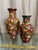 Vintage Chinese pair of floral enameled and brass Cloisonné vases. Marked China on underside in both vases. Medium vase is...