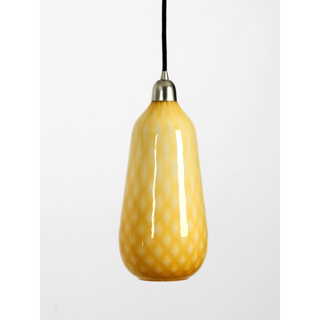 Beautiful yellow & white italian Mid Century Murano glass pendant lamp in rare design with a checked pattern....
