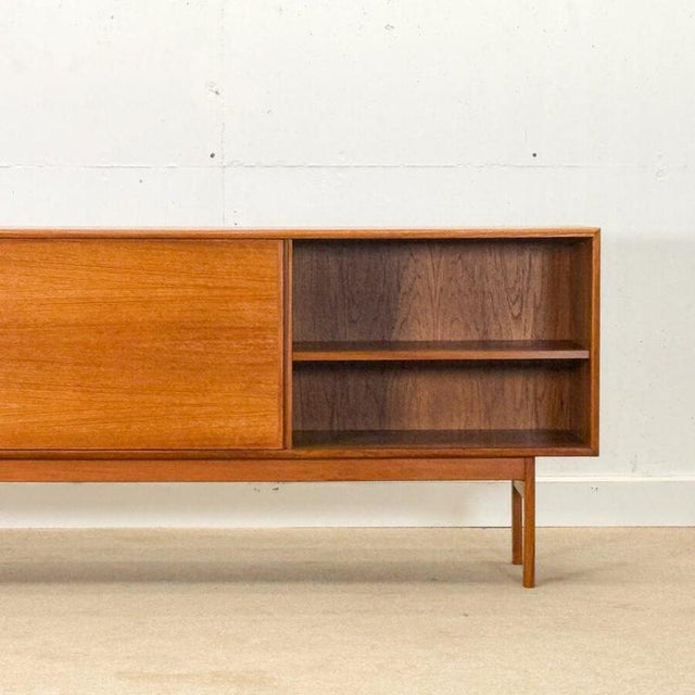 Elegant Danish Mid-Century sideboard dating from the 1960s , beautifully crafted in teak and reflecting the clean,...