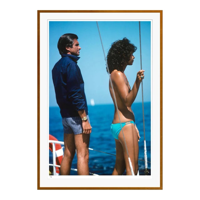 George Hamilton 1977 by Slim Aarons Brown Framed C-Print For Sale