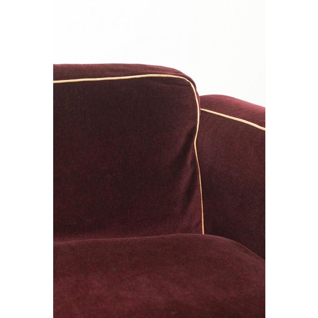 Cassina duc two-seater sofa in original burgundy velvet, 1970s design by mario bellini mario bellini's 1976 duc design is...