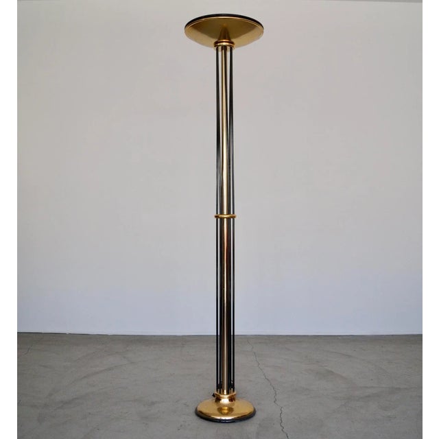 Vintage Mid-century Modern Art Deco floor lamp for sale. It was manufactured in Italy by design lighting company Relux in...