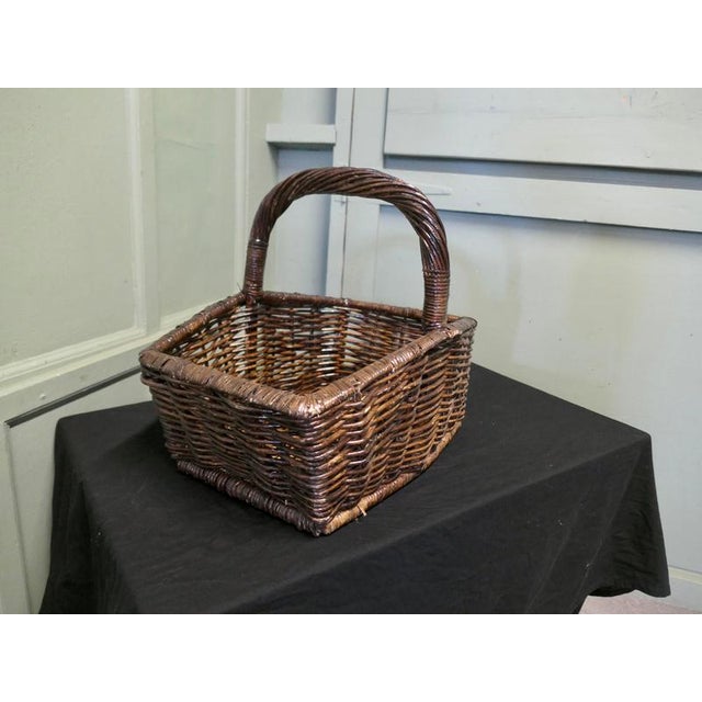 French Market Seller’s Antique Wicker Flower and Fruit Basket This is an unusually shaped French Costermonger’s Flower and...