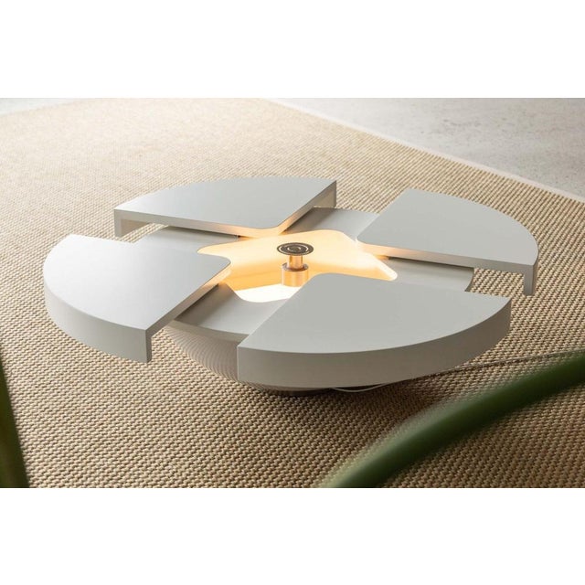 A magnificent example of Italian radical design ingenuity from the late 1960s, this extraordinary low round coffee table,...
