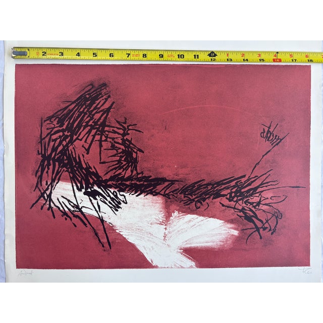 This is the July calendar page printed for Universe Books. The text at the bottom reads "Aquatint in two colors from a...