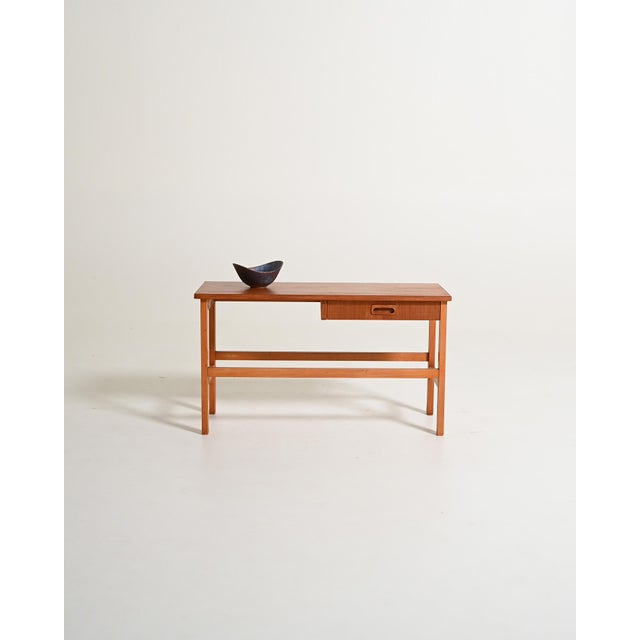 Teak coffee table with drawer. Scandinavian production, 1960s. Coffee table produced in Scandinavia in the 1960s. The...