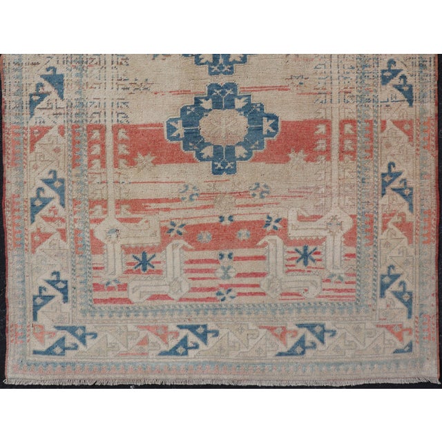Mid 20th Century Tribal Medallion Design Vintage Turkish Oushak in Cream, Blue, and Terracotta 4'5 X 6'7 For Sale - Image 5 of 11