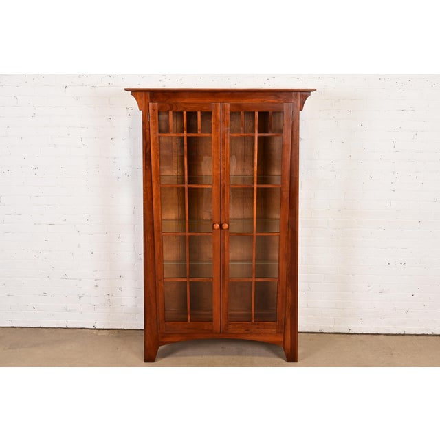 A gorgeous Mission or Arts & Crafts style lighted display cabinet or bookcase In the manner of Gustav Stickley or Harvey...