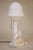 A sophisticated and elegant hand carved milky White Alabaster Marble Art Deco "Fairy" style table lamp with a charming...