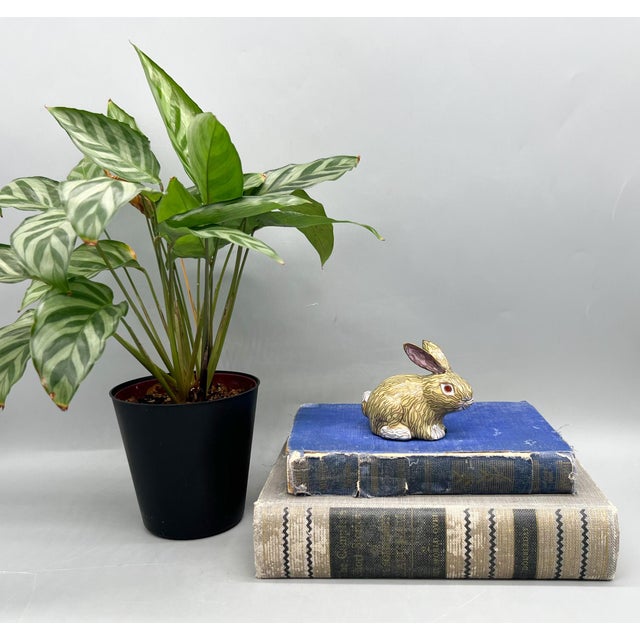 Charming vintage Chinese cloisonné rabbit figurine crafted from hollow metal and covered in intricate enamel decoration....