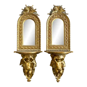 Antique Carved Giltwood Hanging Shelves With Arched Mirror and Putti - a Pair