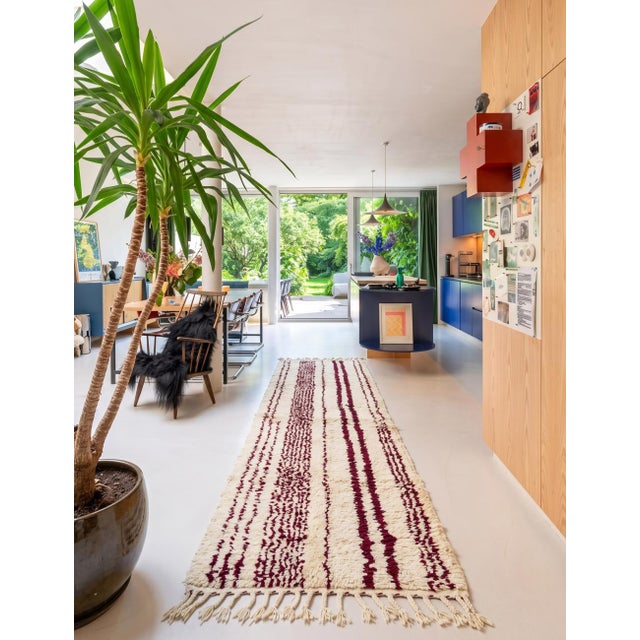 Contemporary Moroccan Runner | Handwoven Berber Wool Runner with Ivory Field and Burgundy Stripes This clean, graphic...