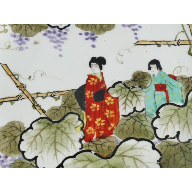 Meiji Hand-Painted Kutani Porcelain Charger with Women and Vine Arbor, 1920s For Sale - Image 9 of 18