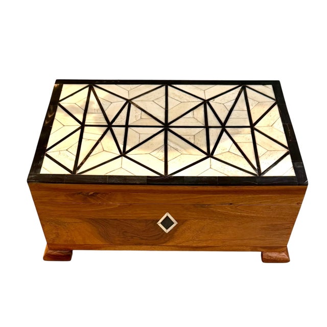 A beautifully crafted vintage Indian work or storage box dating to approximately the 1970s. The substantial rectangular...