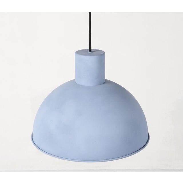 A 1970's large Danish domed pendant light fixture in baby blue satin finish. The simple design complements Scandinavian or...