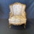 An exquisite pair of French Louis XV style giltwood bergères armchairs or wingback chairs, circa 1880, having carved...