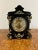 Antique Victorian quality marble eight day mantle clock having a quality black marble mantle clock with ornate gilded...