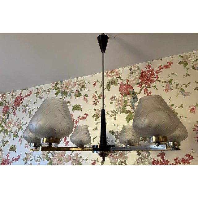 Beautiful lamp, crystals in perfect condition, revised wiring, comes with bulbs. It has slight wear of paint that is not...