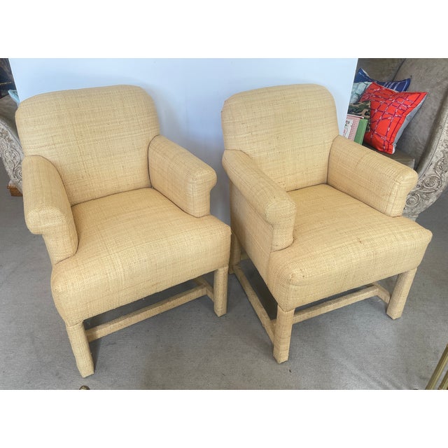 Just in this very good looking Pair of Vintage Natural Raffia Armchairs, by Baker 1980s. This pair is in great condition,...