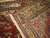 An early 20th century horizontally handwoven Persian Malayer rug with a green field, accents in red and gold Measures:...