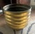 A unique solid brass planter or Jardiniere.. The piece has a wonderful patinated brass finish and is ribbed from top to...