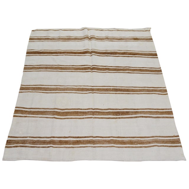 Flatweaved with care using traditional rug-making techniques, this hemp rug blends timeless craftsmanship with a modern...