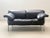 Iconic two-seater sofa, model *pause*, designed by pierluigi cerri for poltrona frau. This 1990s design combines generous...