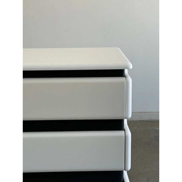 W77 D18 H30 This beautiful post modern dresser has been fully repainted. With little to no signs of wear. Only discrepancy...