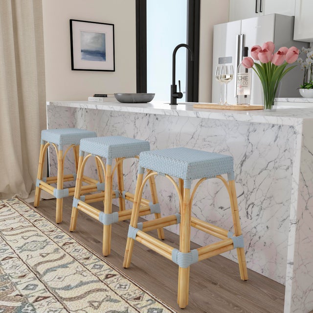 Evoking images of sidewalk tables in the Cote d'Azur, counter stools like this will give your kitchen, dining area, or...