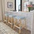 Evoking images of sidewalk tables in the Cote d'Azur, counter stools like this will give your kitchen, dining area, or...