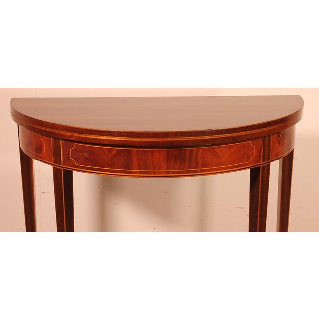 Elegant mahogany console or games table Very beautiful console which is decorated with lemon tree inlays on the belt as...