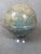 Vintage National Geographic globe from 1961 with acrylic glass stand. The paper/cardboard globe can be removed from the...