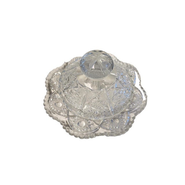Stunning American Brilliant Period crystal lidded butter dish in excellent condition. Light test expresses manganese...